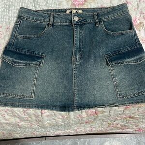 Very cute Mini denim skirt, with six very convenient pockets,so comfortable too!